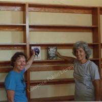 Photograph of Pattie Kehde and Mary Lou Wright with the First Two Books on the Raven Bookstore&#039;s Shelves, 1987.